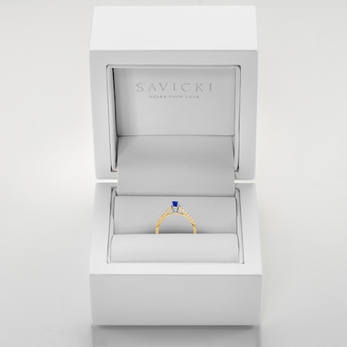 Pierścionek Heart of the Ocean: dwukolorowe złoto, niebieski szafir